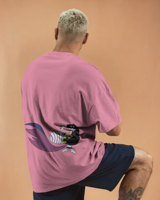 Back view of a man wearing a pink oversized Power Puff Girls t-shirt featuring a cartoon character design.